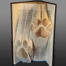 Load image into Gallery viewer, Hand Folded Paw Print Book Display Art
