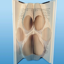 Load image into Gallery viewer, Hand Folded Paw Print Book Display Art
